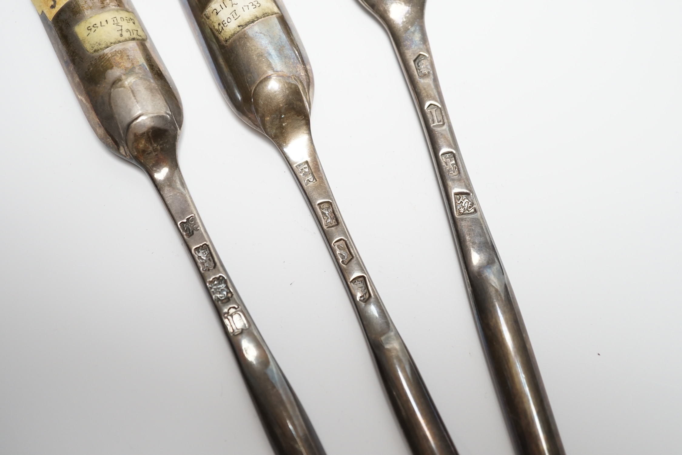 Three George II silver marrow scoops, Richard Pargeter, London, 1733, 20.7cm, Ann Hill, London, 1734 and Ebeneezer Coker?, London, 1755.